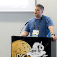 Nathan Sweeney speaking at a conference